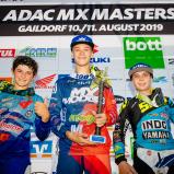 ADAC MX Masters 2019 , ADAC MX Masters Gaildorf, Tagessiegerehrung beim ADAC MX Junior Cup 85ccm v.l.n.r.: Ferruccio Zanchi ( Italien / Husqvarna ), Edvards Bidzans ( Lettland / Husqvarna / MX MODULS ) und Sacha Coenen ( Belgien / Yamaha / Grizzly Yamaha 